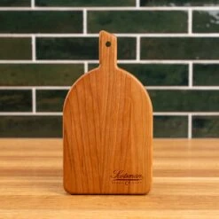 Scotsman Co. Cherry Arched Cheese Board - Handcrafted American Hardwood 18 Scotsman Co. Cherry Arched Cheese Board - Handcrafted American Hardwood -Laurel Mercantile Store Cherry Arched Cheese Board Small 00006