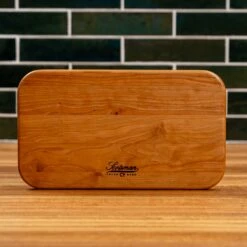 Scotsman Cherry Wood Rectangle Serving Board 22 Scotsman Cherry Wood Rectangle Serving Board -Laurel Mercantile Store NewWoodProducts Cherry June13 2024 085