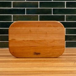 Scotsman Cherry Wood Rectangle Serving Board 25 Scotsman Cherry Wood Rectangle Serving Board -Laurel Mercantile Store NewWoodProducts Cherry June13 2024 092