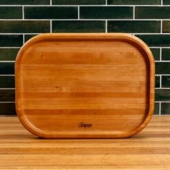 Scotsman Cherry Carving Block with Raised Edge 38 Scotsman Cherry Carving Block with Raised Edge -Laurel Mercantile Store NewWoodProducts Cherry June14 2024 216